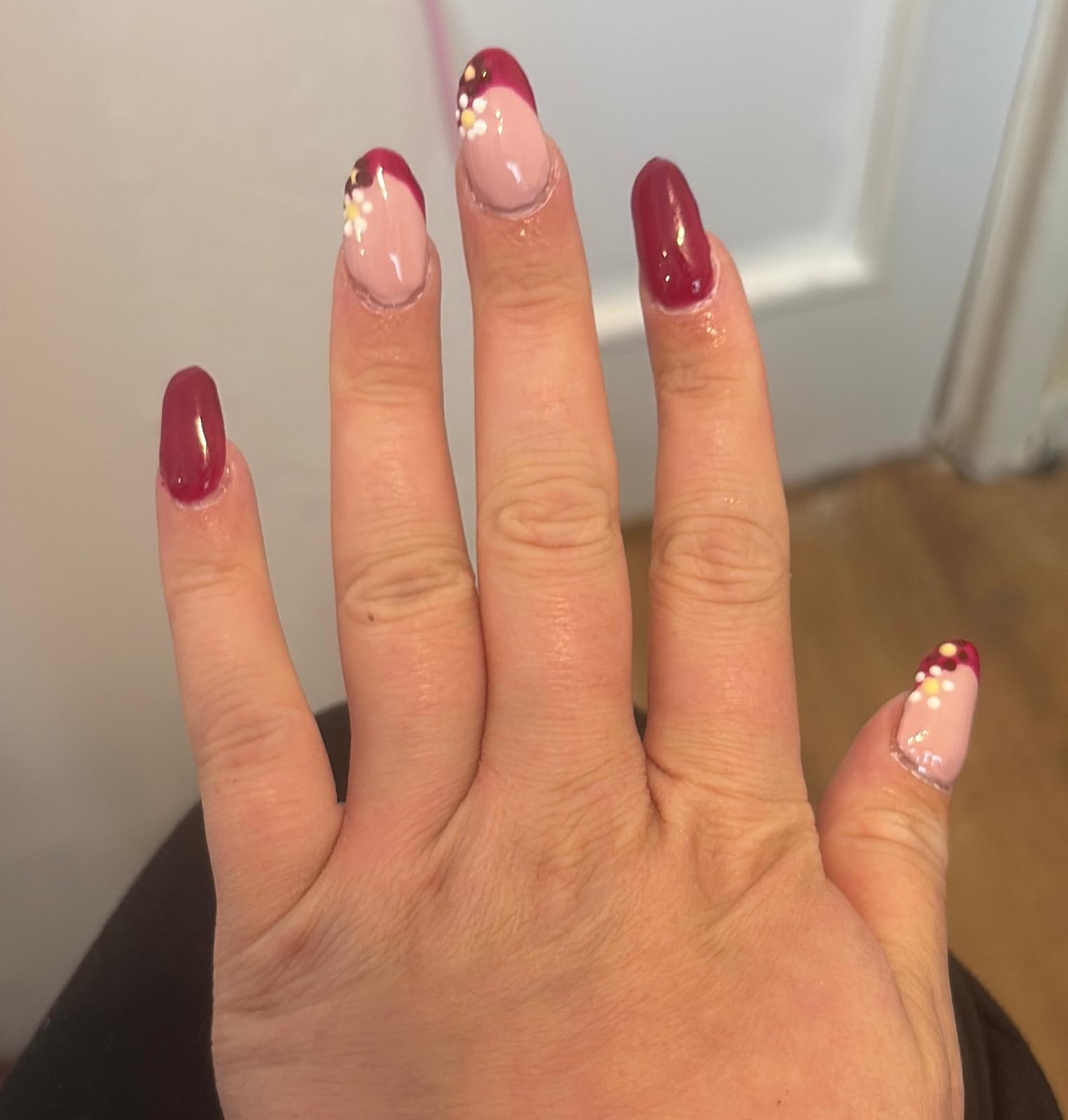 Pearl-accented nails showcasing subtle luxury and refined taste