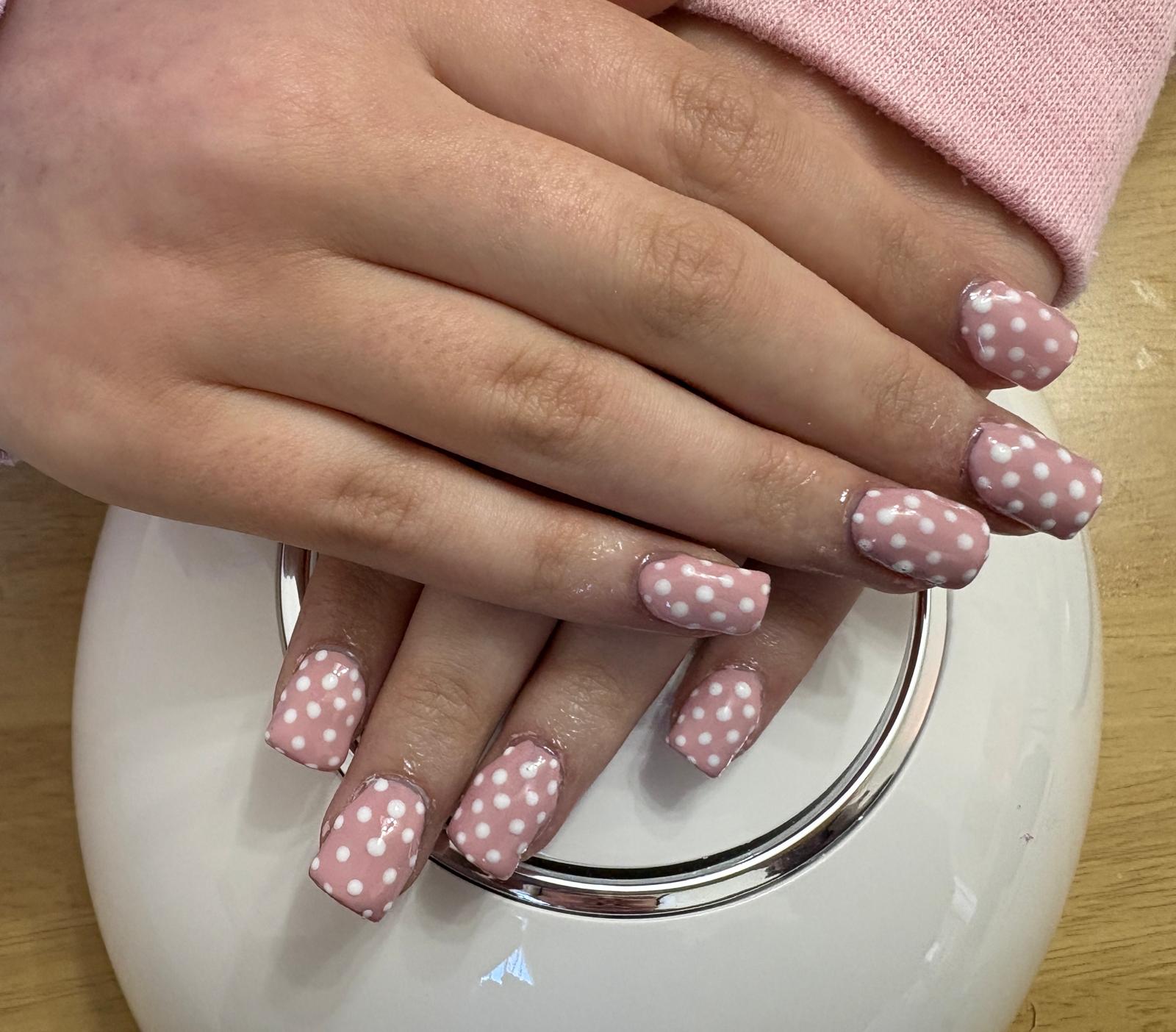 Romantic floral nail design perfect for garden parties and dates